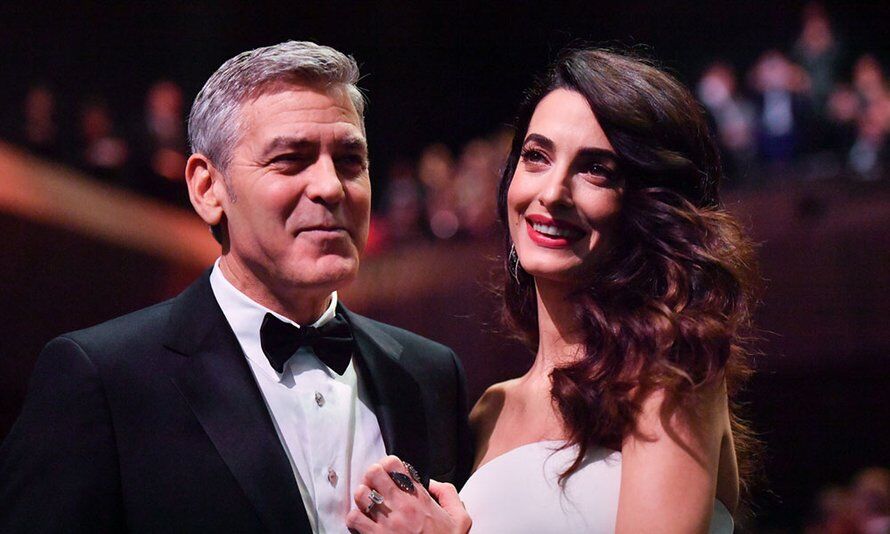Illustratie bij: Hilarisch: zó neemt George Clooney zijn vrouw in de maling als het om de kinderen gaat