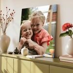 Van foto op de telefoon naar de muur: zo bewaar je gezinsherinneringen op een bijzondere manier