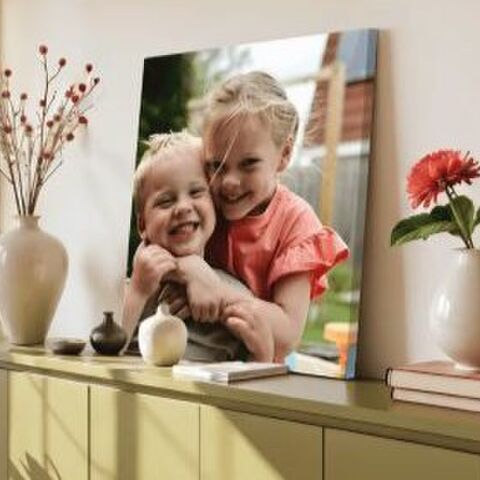 Illustratie bij: Van foto op de telefoon naar de muur: zo bewaar je gezinsherinneringen op een bijzondere manier