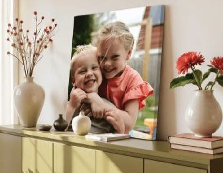 Illustratie bij: Van foto op de telefoon naar de muur: zo bewaar je gezinsherinneringen op een bijzondere manier